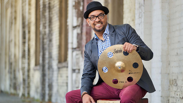 Omar Ledezma Jr. with percussion plate