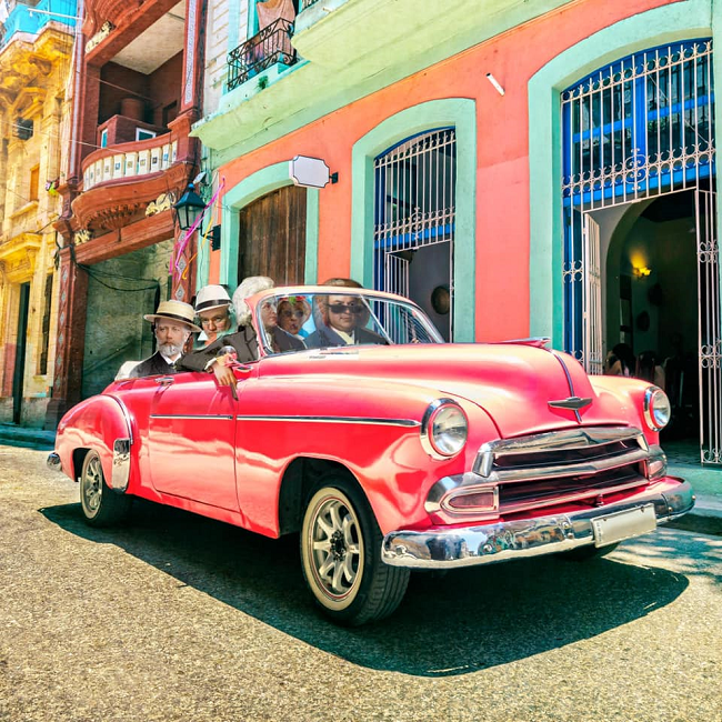 Cuba Classic album cover with colored houses and a red car