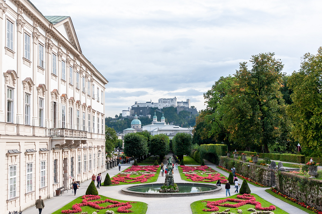 View of the Mirabell Palace with the background of the cathedral and the Fortress in Salzburg, Austria
