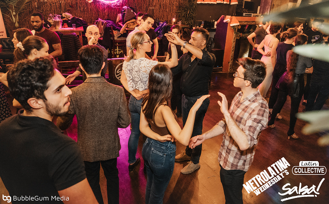 Group of people learning to dance at the Soho Salsa Bar, Restaurant and Nightclub
