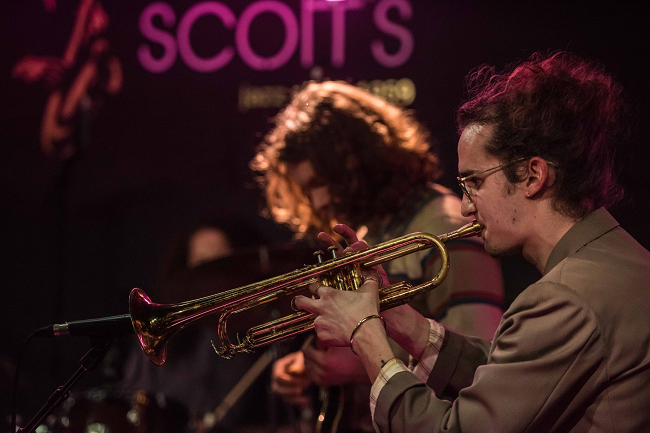 Trumpeter with beige suit on Ronnie Scott's Jazz Club