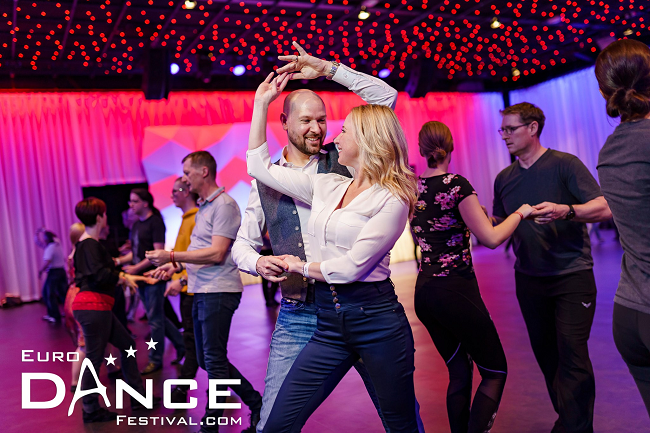 a couple of instructors dancing at euro-dance festival